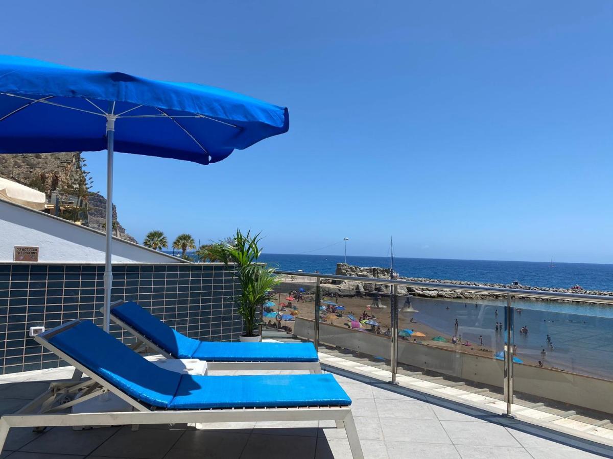 Billy'S Beachfront Apartment With Pool Access Puerto De Mogan Dış mekan fotoğraf