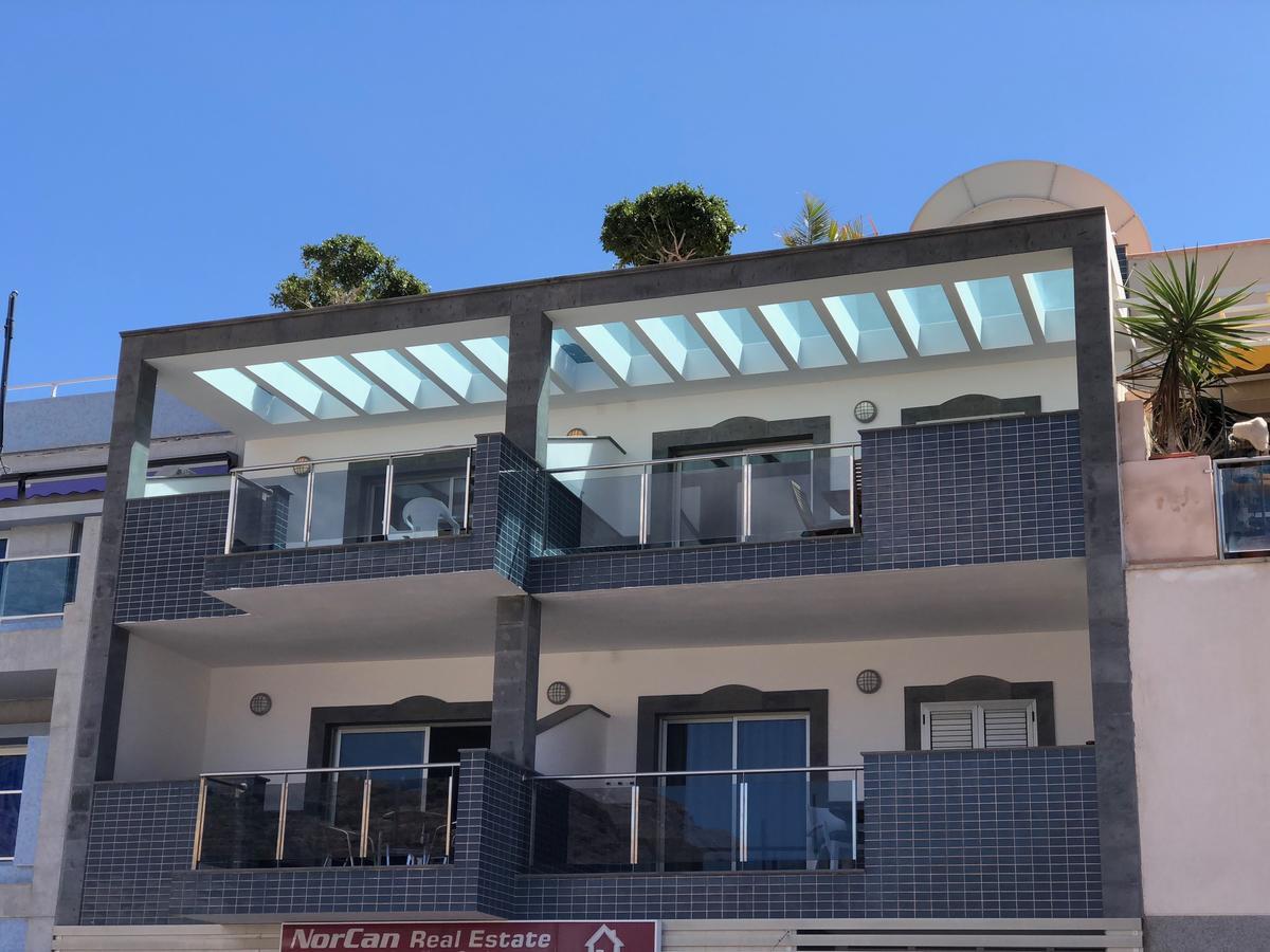 Billy'S Beachfront Apartment With Pool Access Puerto De Mogan Dış mekan fotoğraf
